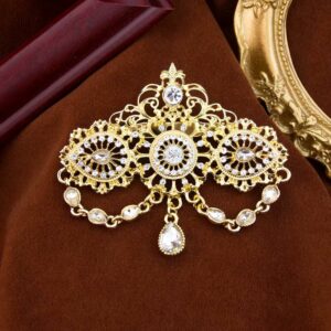 Broche médiévale à chaînes avec pierres transparentes