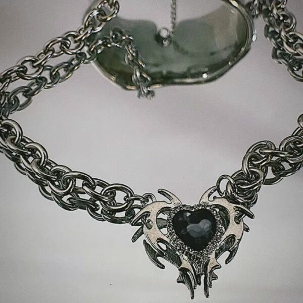 Collier chaîne double cœur noir et griffes d'argent