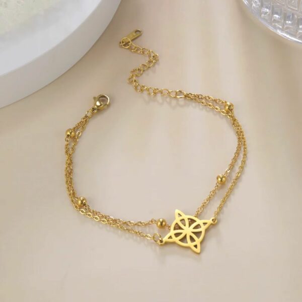 Bracelet double chaîne doré avec nœud celte
