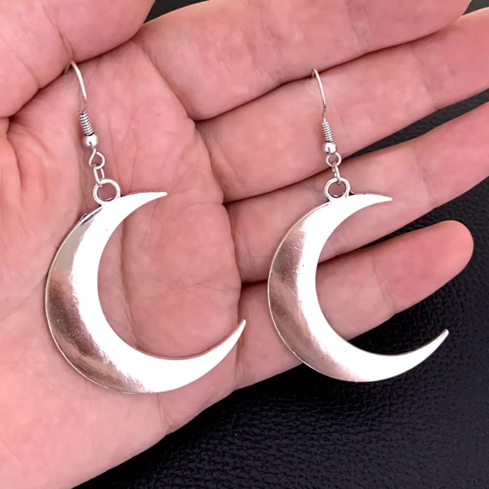 Boucles d'oreilles croissant de lune argentées brillantes